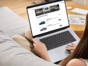 Loyalty in automotive - woman booking a test drive on her laptop using Appointedd